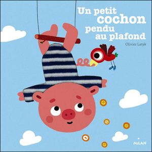 Un petit cochon pendu au plafond