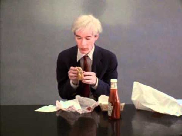 Andy Warhol Eats a Hamburger