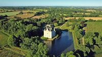 Moat, Pineapple Chandeliers and a Wedding