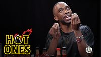 Jay Pharoah Has a Staring Contest While Eating Spicy Wings