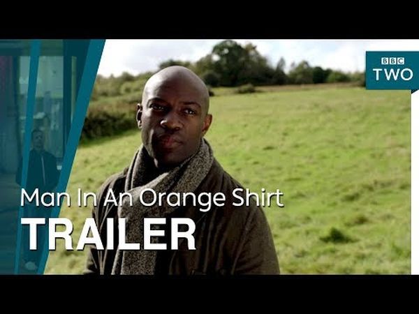 Man In An Orange Shirt