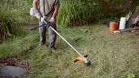 Débroussailleuse, Arroseur de jardin et objectif de caméra