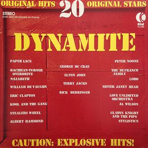 Dynamite – Caution: Explosive Hits