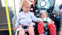 BABY SINGING TO A BABY ON A TRAIN! (cutest girl ever)