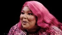 Lizzo Earns Her Hot Sauce Crown While Eating Spicy Wings