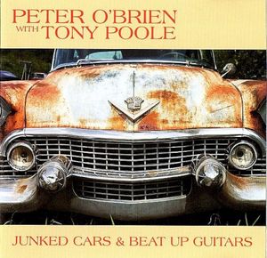 Junked Cars & Beat Up Guitars