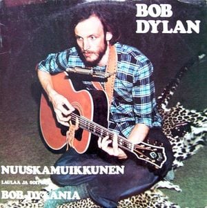 Laulaa ja soittaa Bob Dylania