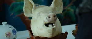 Bring me the head of a smiling pig