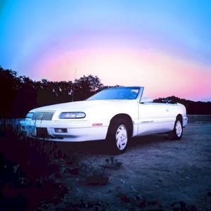 White Chrysler LeBaron (Single)