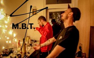 M.B.T.